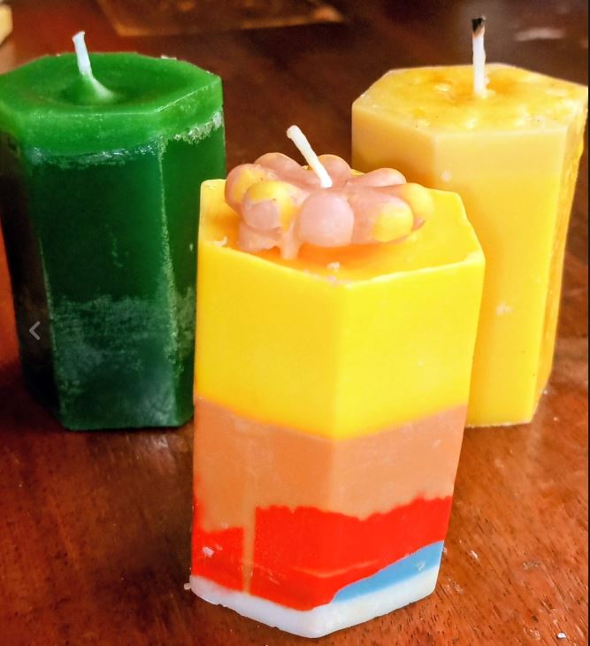 Several Hexagon Scendet Candles